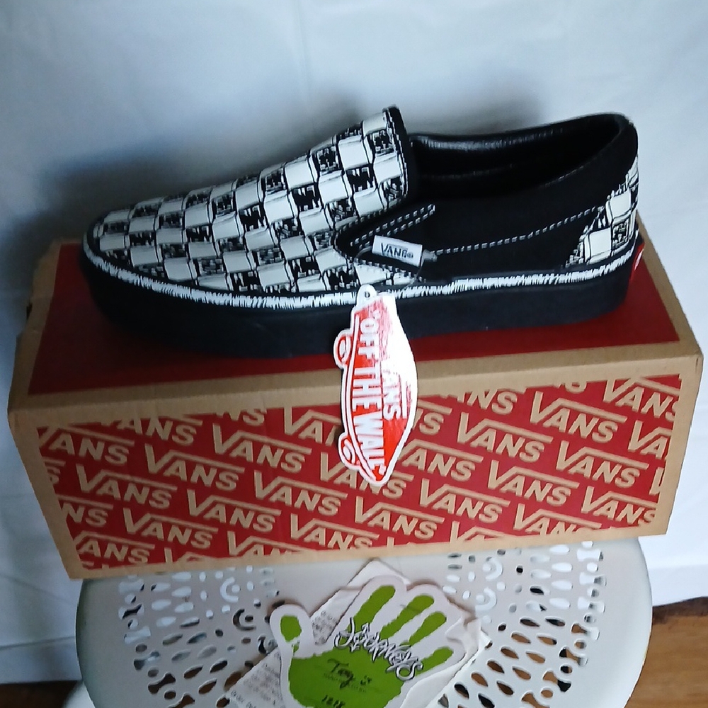 Vans Black and White Logo Slip-On Sneakers